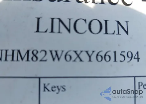 1999 Lincoln Town Car Signature z USA, uszkodzony, nr VIN 1LNHM82W6XY661594